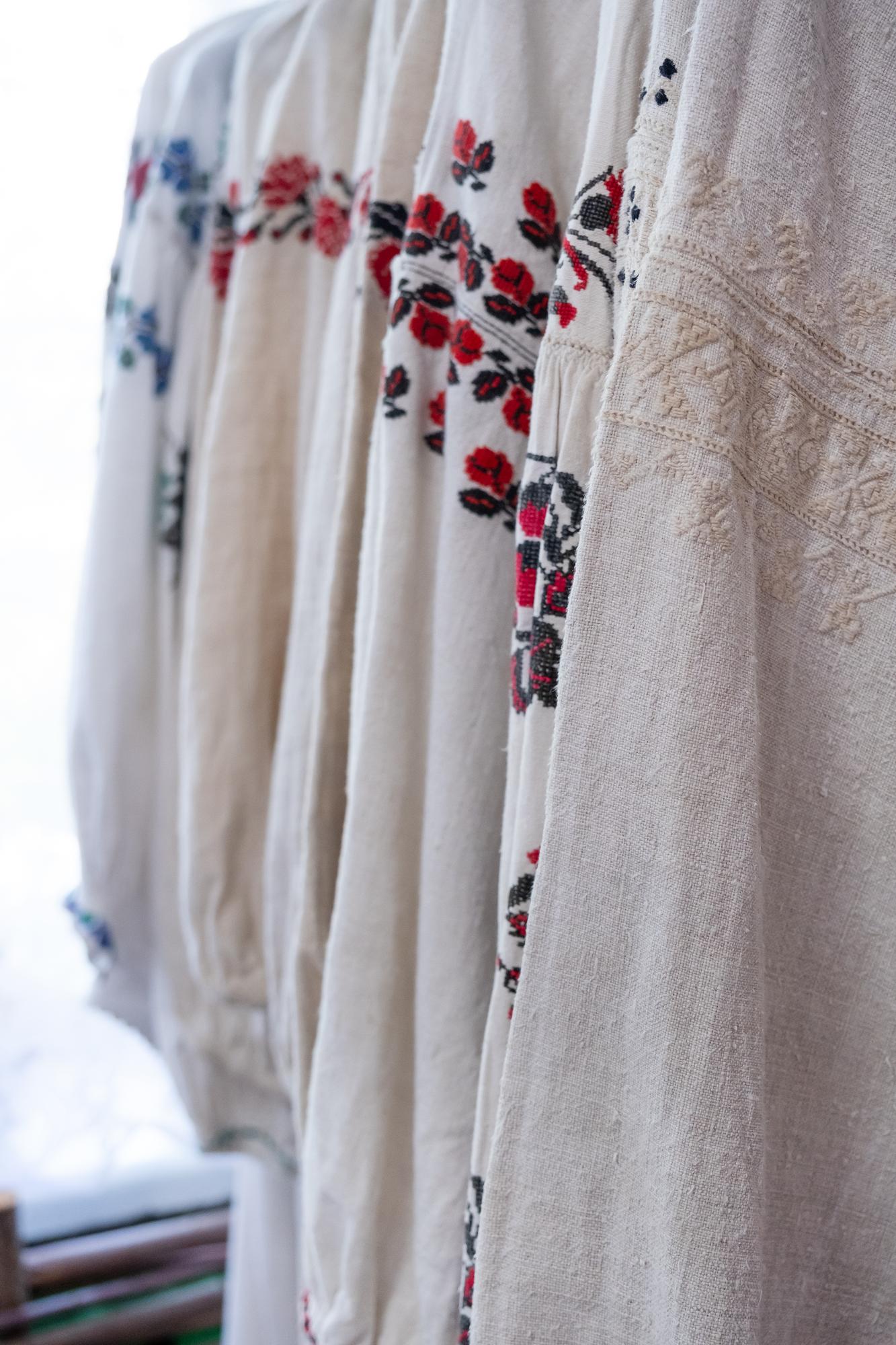 atelier window with embroidered linens