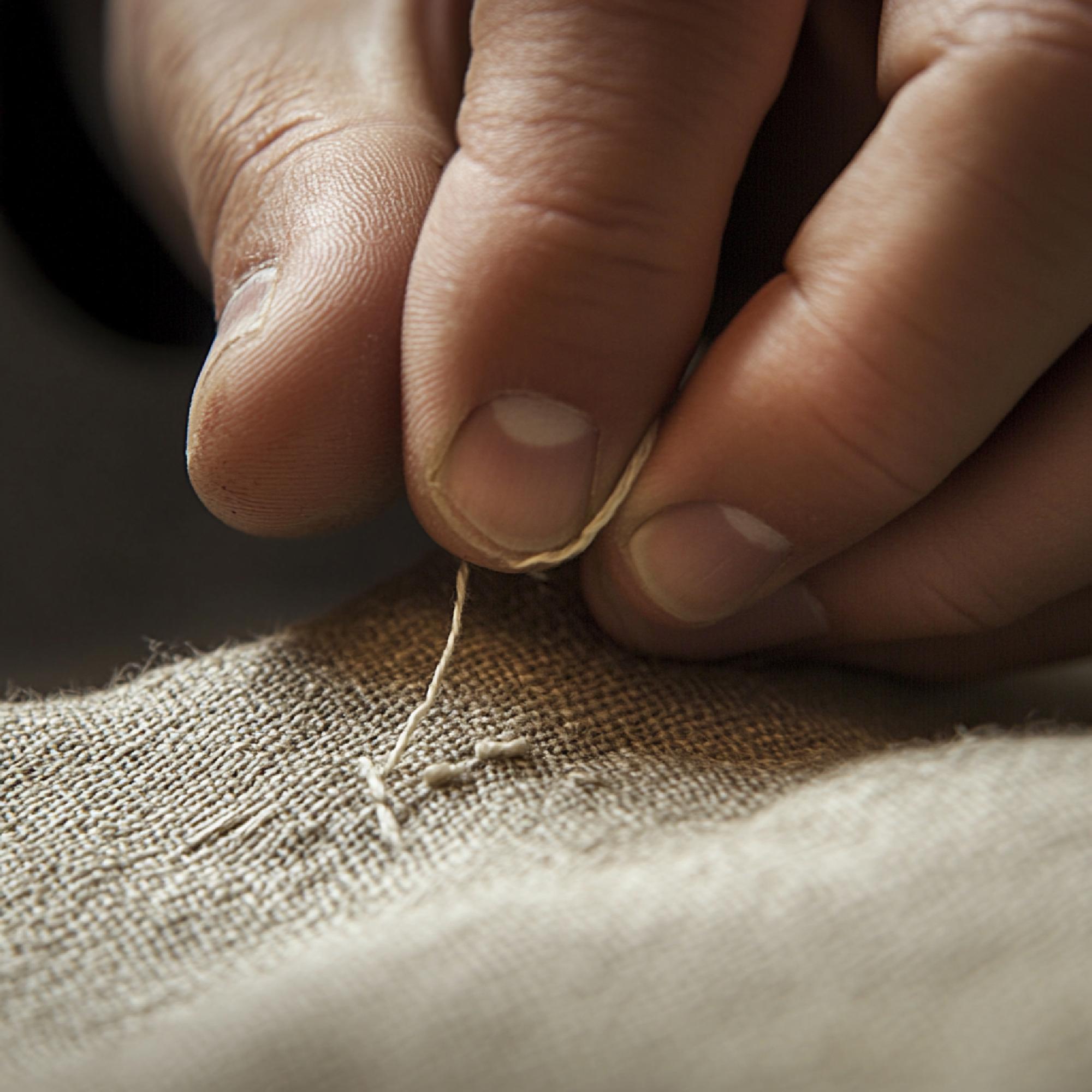 close-up artisan hand embroidery on linen