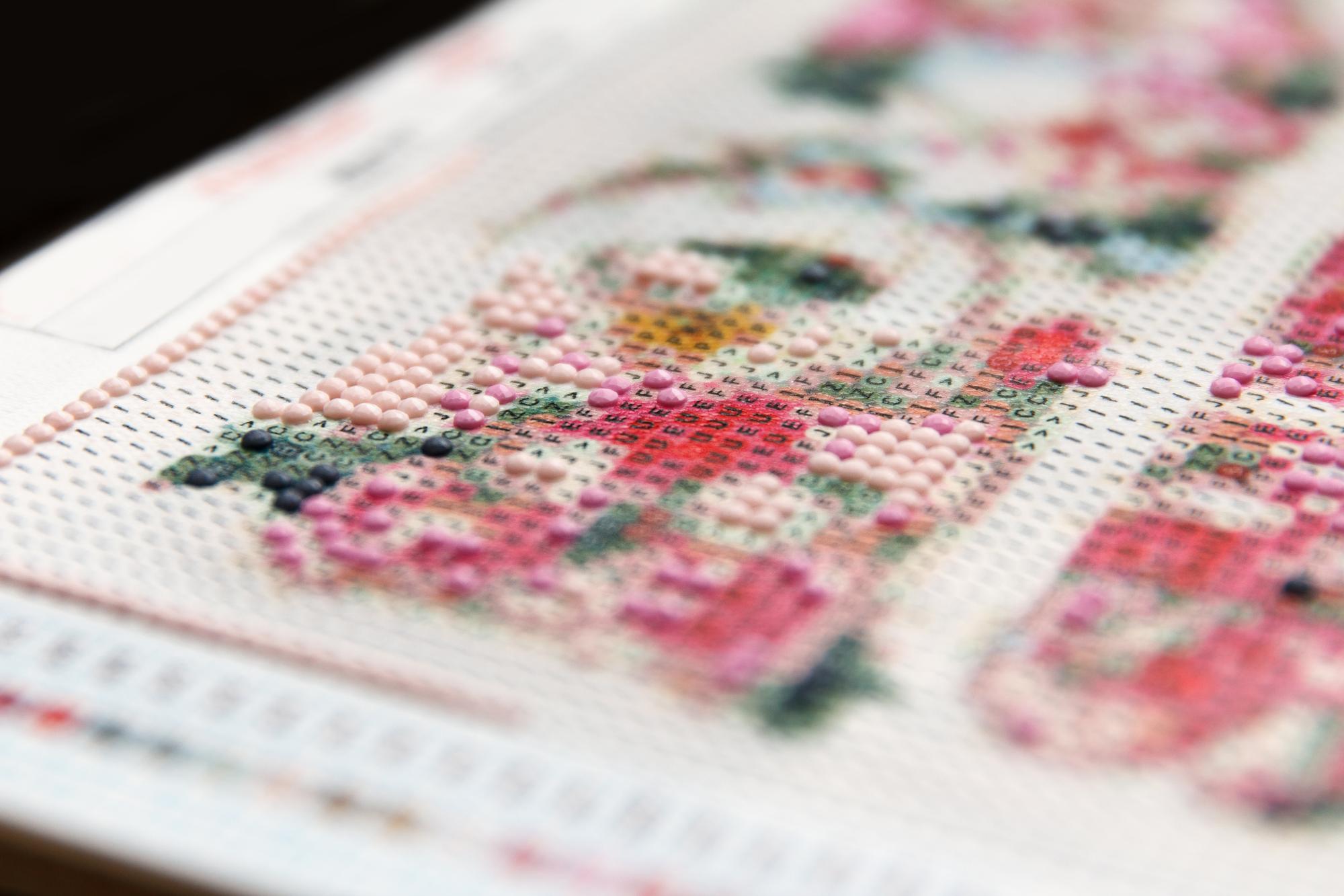 selection of embroidered samples on fabric